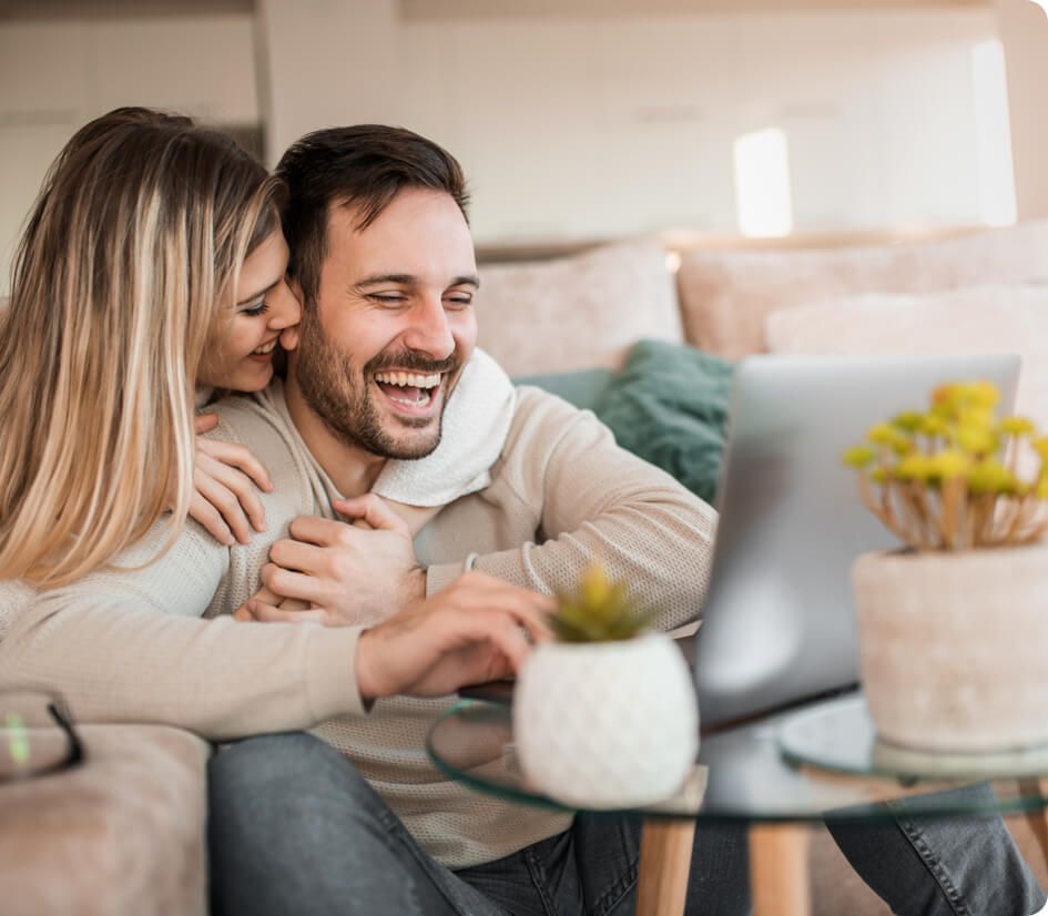 Couple feeling resolve and happiness during a virtual therapy session